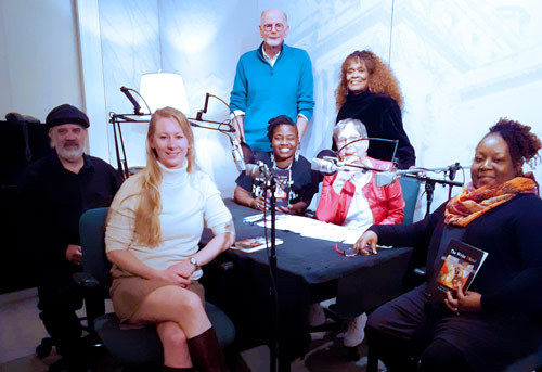 Picture of The Write Blend Poets on-air, L to R: Clifford Bernier, Liz Reitzig, Diane Wilbon Parks, (Grace Cavalieri,) Miss <ETH>Kiane Thomas. Standing: Dr. Hiram Larew and Billye O?Kera.